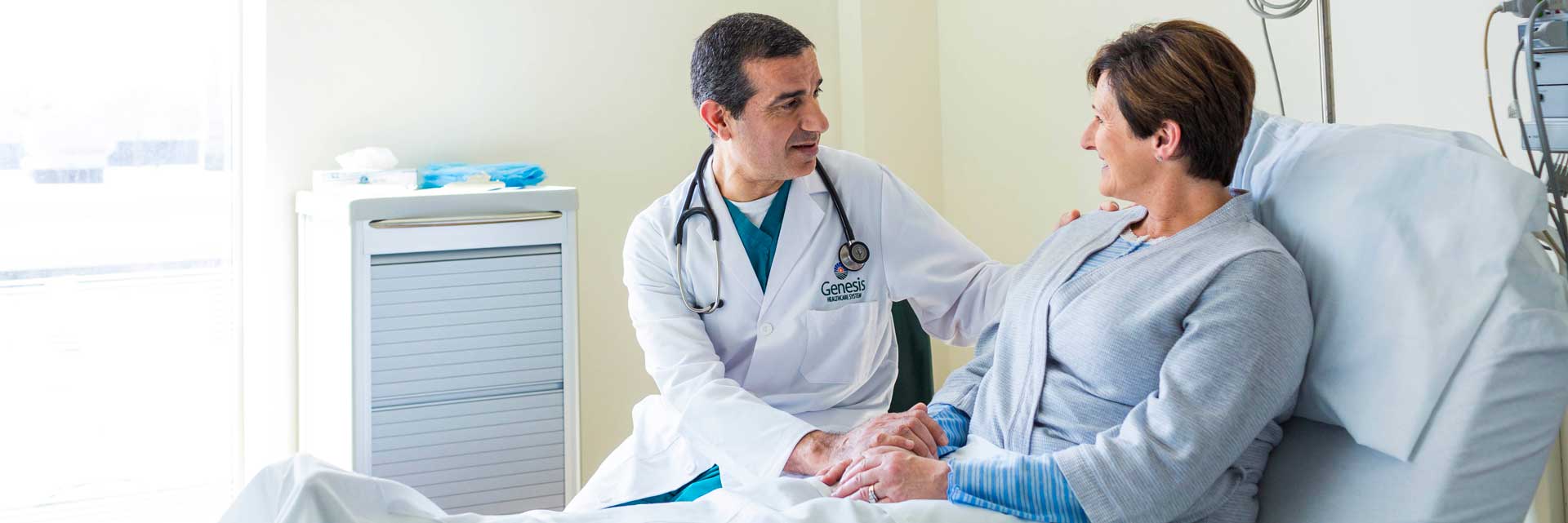 Genesis Heart and Vascular provider comforting a patient