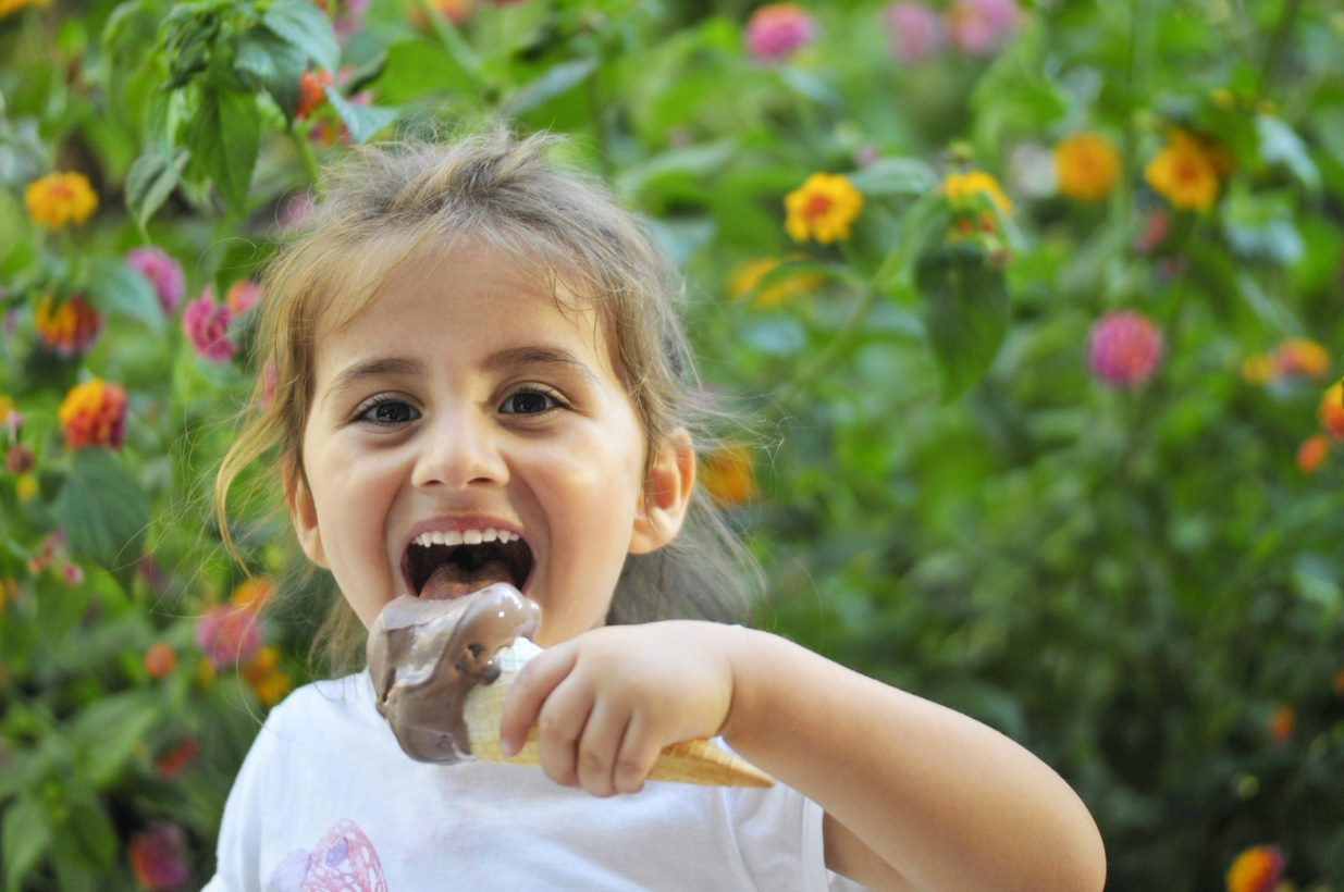 Child eating ice cream cone