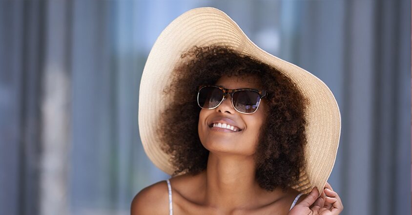 woman wearing a hat