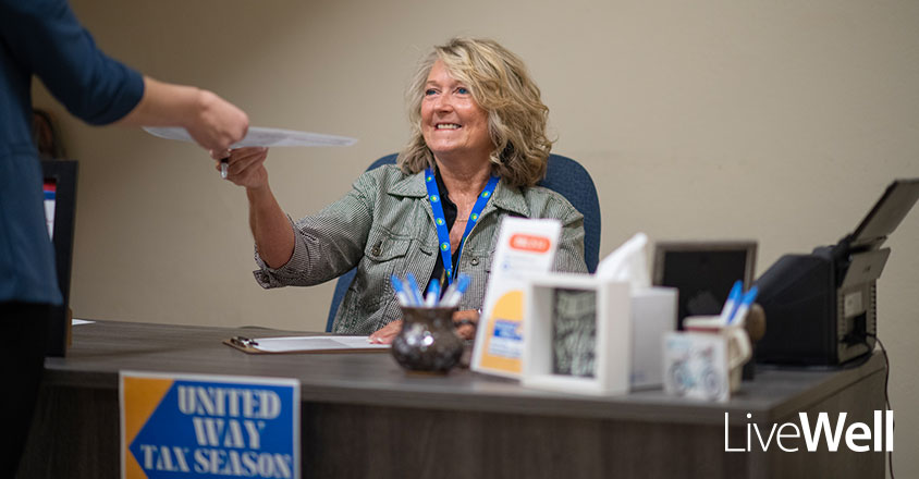 Genesis employee volunteering at United Way Tax Clinic