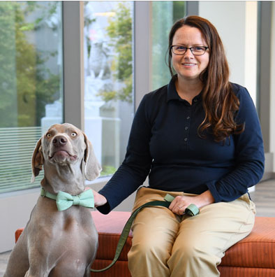 Genesis therapy dog, Theo, Weimaraner breed, with owner Susan Bieterman