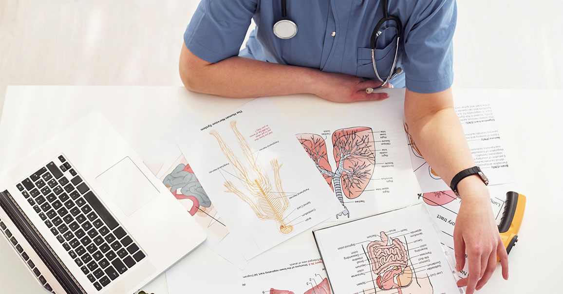 Physician Memorial Scholarship - Healthcare worker studying for exam