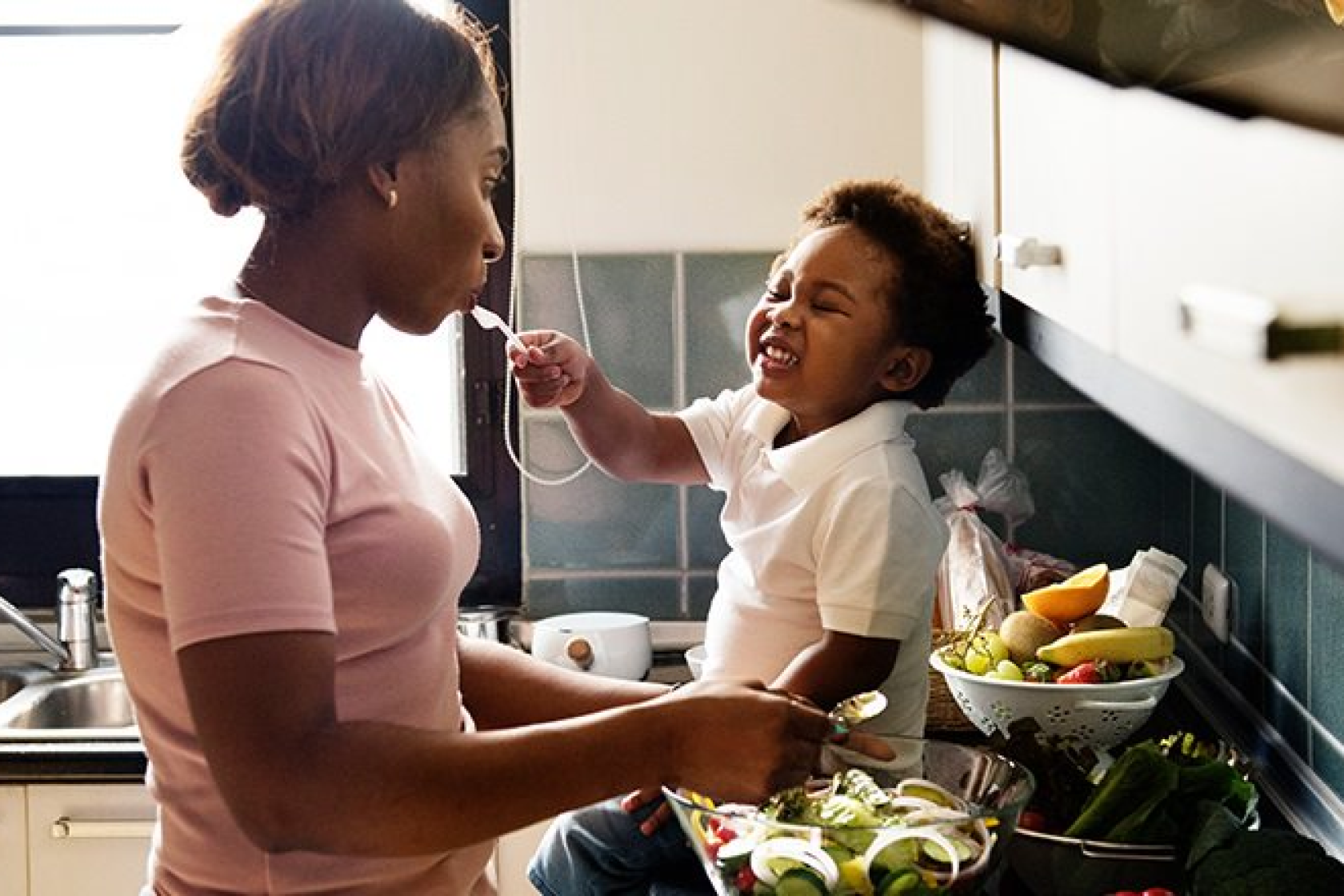 mother and child cooking together