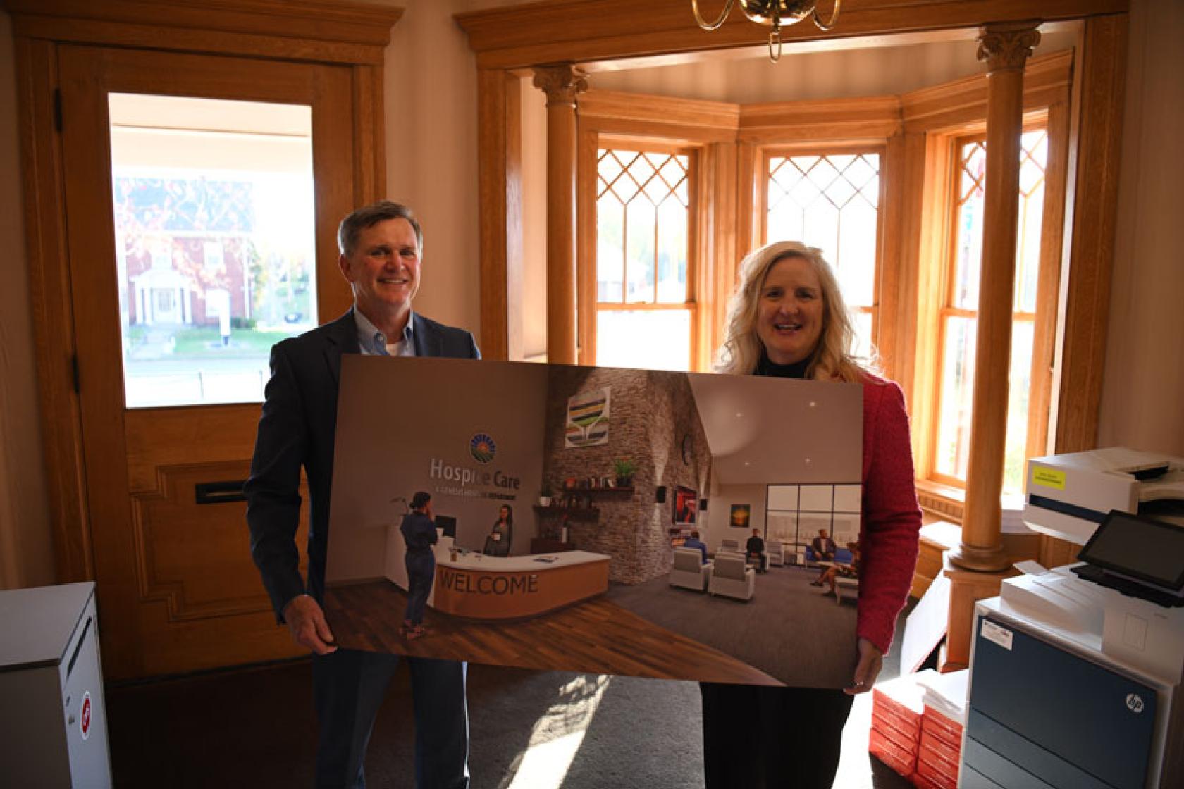 Jim Nicholson from North Valley Bank donates to Genesis Hospice Capital Campaign