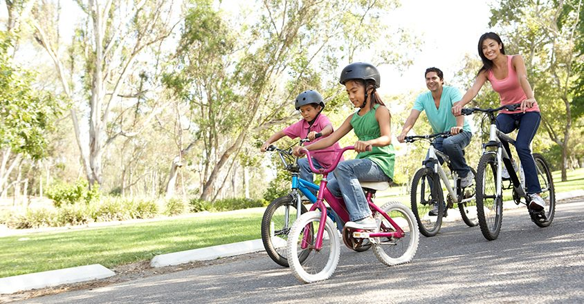 family riding bikes