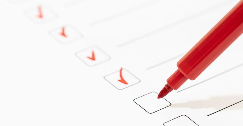 red marker checking off a to-do list