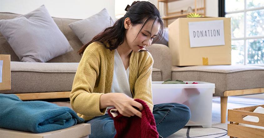 woman organizing her clothes