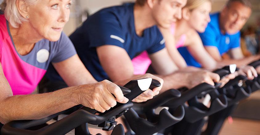 people taking a cycling workout class