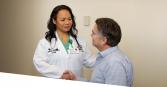 Emily J. Brawner, D.O., and patient, shaking hands