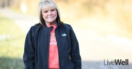 Genesis Heart and Vascular patient testimony feature image of Julie McClure, smiling outside on a sunny winter day